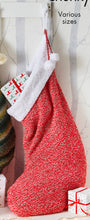 Load image into Gallery viewer, Large Christmas stocking hand knitted in a red super chunky yarn with flecks to give a subtle striped and glitter effect. The top is knitted in Cuddles chunky yarn for a soft, textured cotton wool like finish
