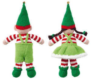 The back of the two elf toys showing their dungaree and dress straps along with the back of their hats and boots, their striped legs, upper bodies and arms and the dark brown pigtails of the one on the right.
