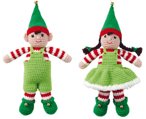 Image of two crocheted elf toys. Both have emerald green boots with bells attached. The hats have a red brim. Both have red and white striped tops and stockings. One has light green dungarees and the other a fur trimmed dress and dark brown pigtails