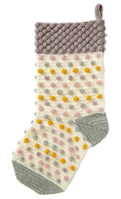 Load image into Gallery viewer, Image of a crocheted stocking. The heel and toe are crocheted in grey and the main leg in cream. The main section has rows of bobbles in pale pink, grey and green with antique gold. The top is covered in bobbles and crocheted in grey or silver yarn