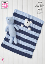 Load image into Gallery viewer, Front cover of King Cole knitting pattern 4005. A light blue teddy bear toy knitted in garter stitch is lying on a blue and white striped baby blanket. The blanket has the head and front paws of a white bear sewn on so the bear looks tucked up in bed