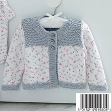 Load image into Gallery viewer, Close up of the main, long sleeve cardigan in white and silver hanging on a hanger