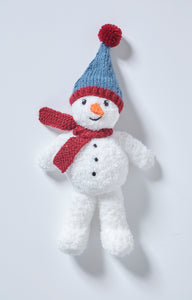 Fun Snowman toy knitted in a fake fur white yarn for added snowy texture. He had 3 black dots down his front and an orange carrot nose. His dark red scarf is knitted in garter stitch and his blue hat has a red band and red pom pom 