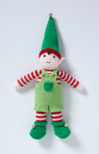 Load image into Gallery viewer, A mischievous toy elf ready for the popular advent game. Green boots with roll tops and gold bells. Red and white striped trousers and sleeves. Light green dungaree shorts with a green front pocket. A green hat with red band, topped with a gold bell