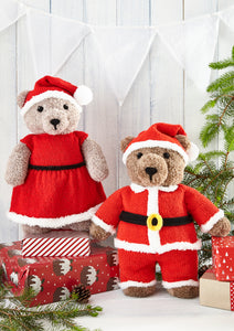 Father and Mother Christmas bear toys. Santa wears red with white fur trim trousers and jacket with collar and black belt with gold buckle. His red hat has a white fur trim and pom pom. Mrs Claus wears a red dress with white fur trim and black belt