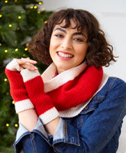 Load image into Gallery viewer, Woman wearing Santa themed snood and wrist warmers or fingerless gloves. Both are knitted in bright red yarn with white rib bands
