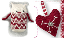 Load image into Gallery viewer, A white owl with dark red wings. Its lower body is rows of red striped tree-like triangles alternating up and down. Finished with large white eyes and black buttons. A dark red love heart ornament is finished with a button and embroidered white lines