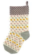 Load image into Gallery viewer, Image of a crocheted stocking. The heel and toe are crocheted in grey and the main leg in cream. The main section has rows of bobbles in pale pink, grey and green with antique gold. The top is covered in bobbles and crocheted in grey or silver yarn
