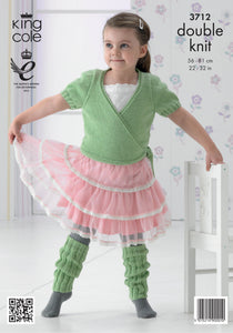 Image of a young girl wearing a pink and white ballet tutu skirt and a short sleeve ballerina style cardigan hand knitted in green yarn with matching dancer leg warmers knitted in rib stitch
