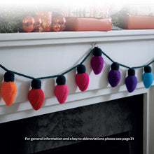Load image into Gallery viewer, A garland of knitted fairy lights hanging on a mantlepiece. The string and tops of each light are knitted in bottle green DK yarn. Each light is a different colour from orange to shades of pink and red, purples and blue
