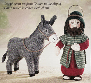 Image of knitted Joseph character with the donkey from the Alan Dart Nativity knitting pattern