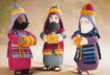 Load image into Gallery viewer, Image of knitted The Three Wise Men from the Alan Dart Nativity knitting pattern. Each wise man is different in their crown, sandals, colour combinations, their beard textures and the gifts they are bearing

